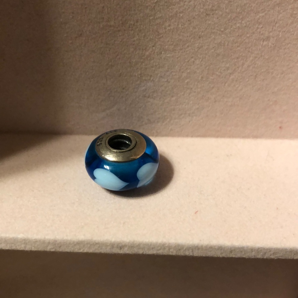 Blue with white heat charm